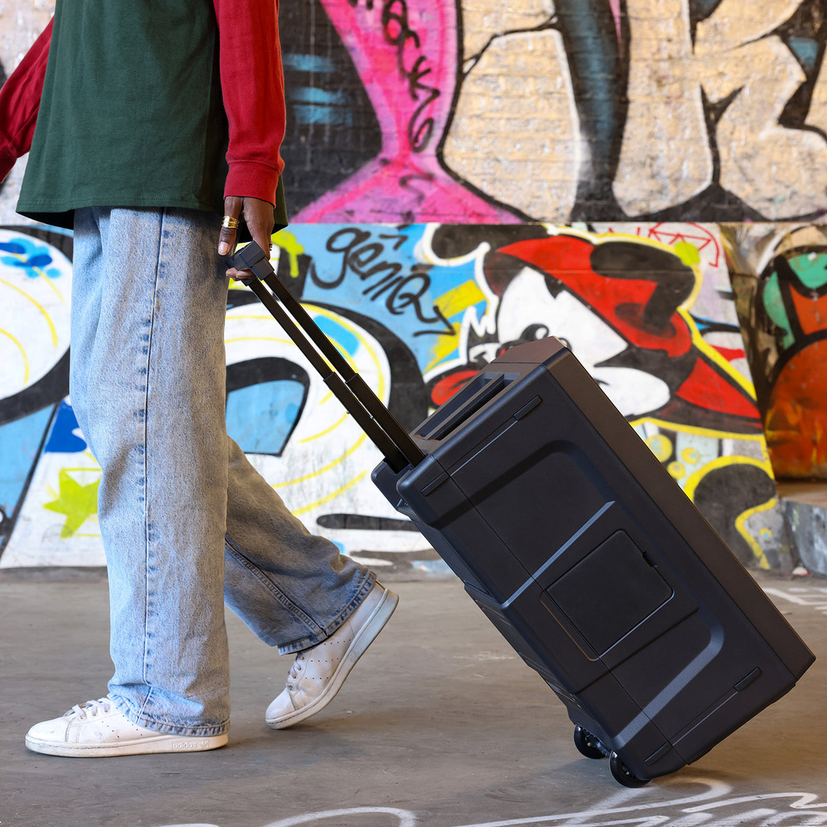 AlphaTheta WAVE-EIGHT being rolled by its trolley handle