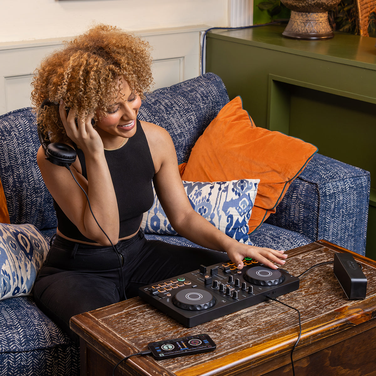 DJ mixing on the DDJ-FLX2 from the couch at home