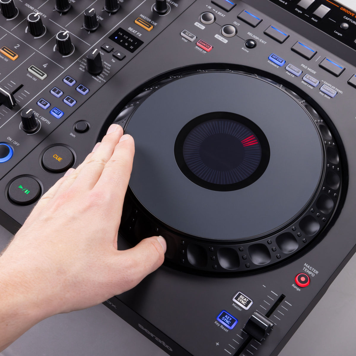 Hand on the DDJ-GRV6 jog wheel