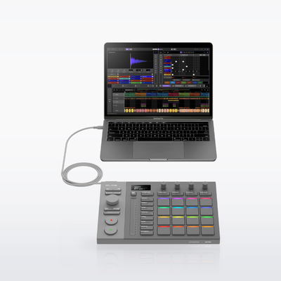 AlphaTheta SLAB connected by USB-C to a laptop running Serato Studio