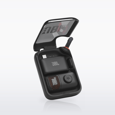 JBL EasySing Mic Mini in its open charging case with the dongle