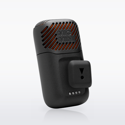 JBL EasySing Mic Mini with the magnetic clip attached, rear view