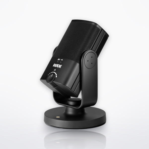 RØDE NT-USB Mini USB condenser microphone on its desk stand, three-quarter front view angled upward
