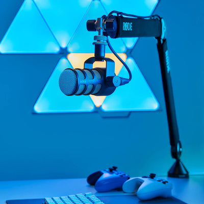 RØDE PSA1+ boom arm holding a microphone over a gaming desk